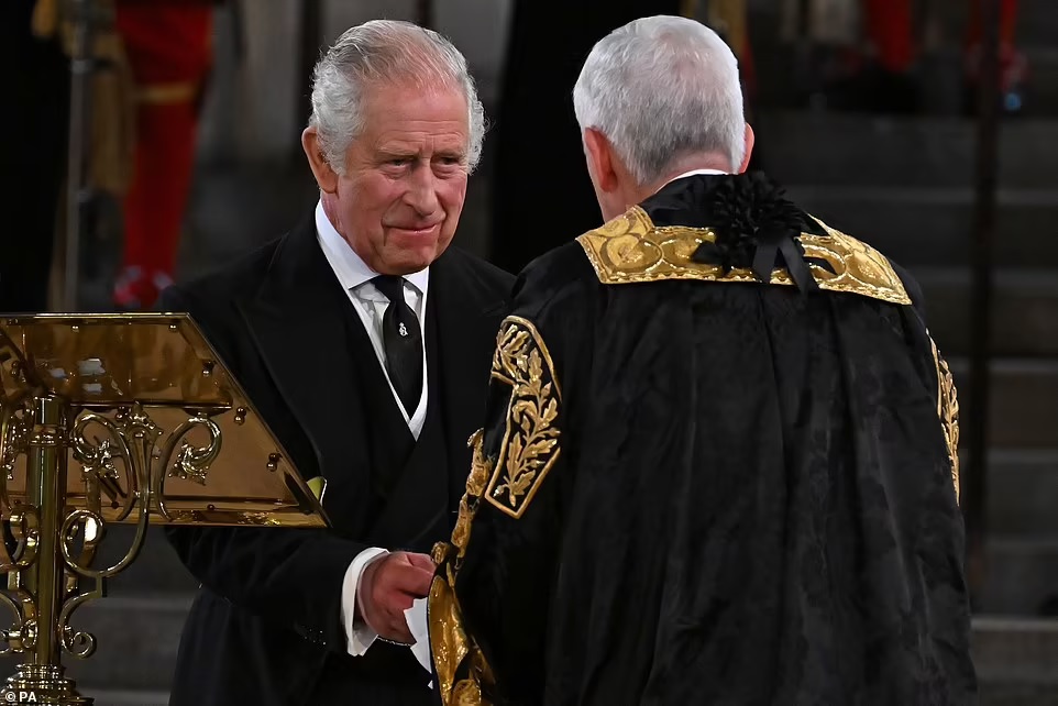 Charles III fights the tears as MPs and peers sing 'God save the King' 