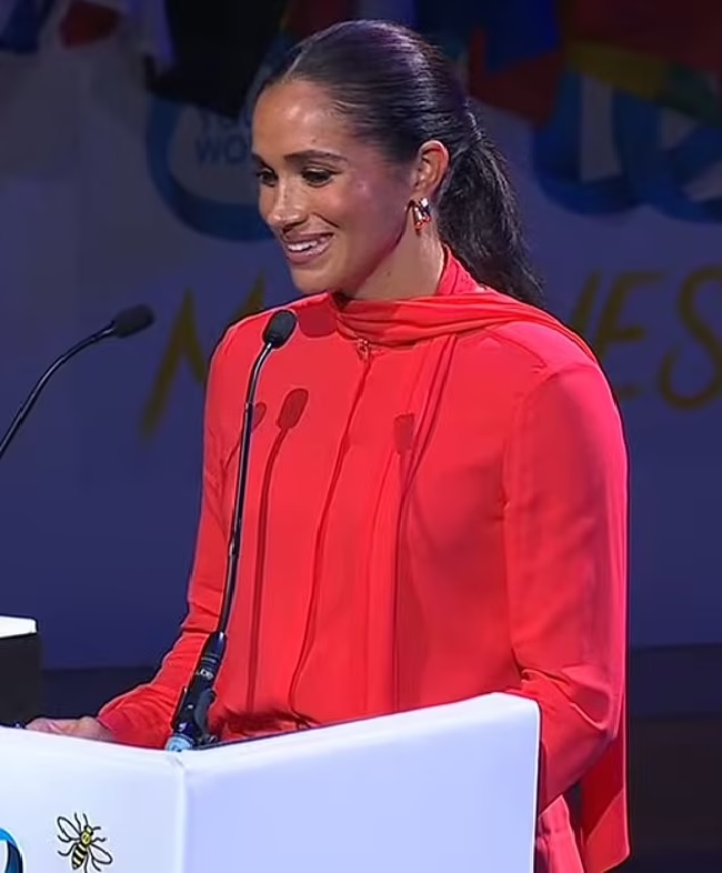 Meghan Markle performed a 'small love letter to Harry with her giggles, nose wrinkles and coy expressions' - but he looked 'much more ill at ease on his return to the UK', claims body language expert