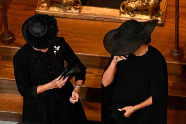 Meghan Markle:Duchess of Sussex wipes away tears in emotional moment at Queen's funeral 