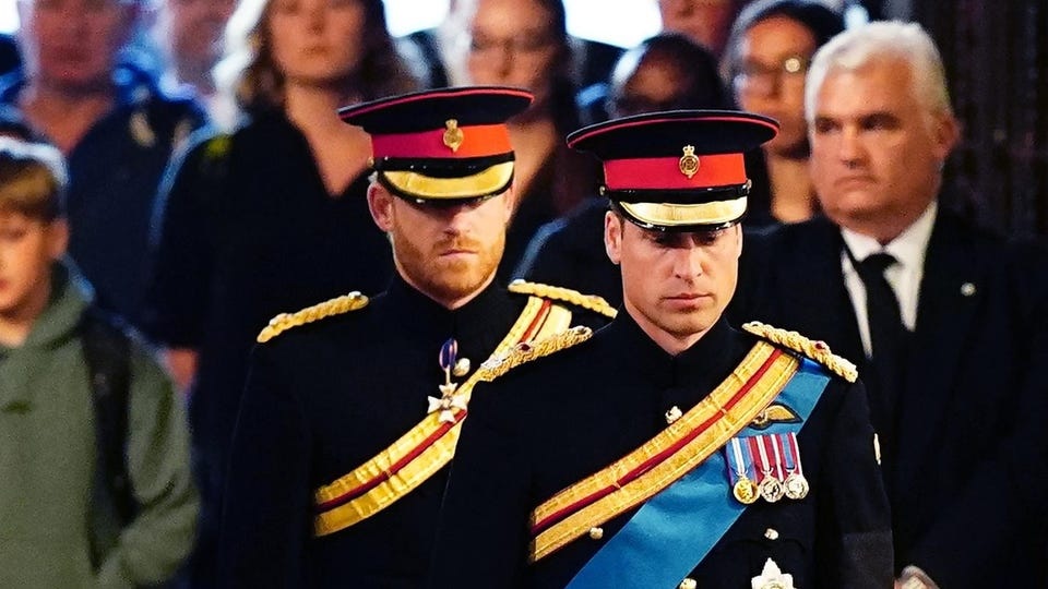 Princes William and Harry lead somber vigil by Queen's coffin