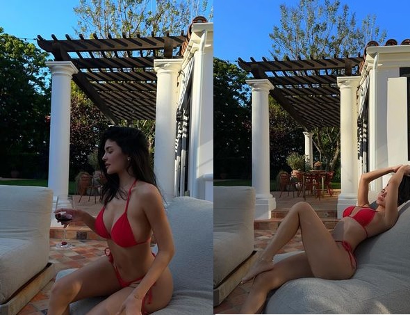 Kylie Jenner stuns fans as she shows off her curves while sunbathing in tiny red bikini